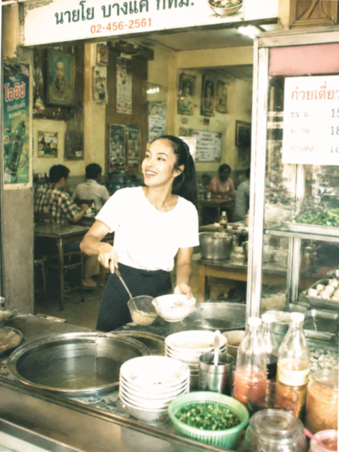 A young Manaow Prasatthong at the noodle soup shop she ran in Bangkok during her law studies at Ramkhamhaeng University