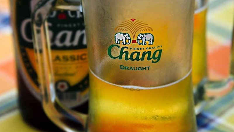Chang beer bottle paired with spicy Thai food