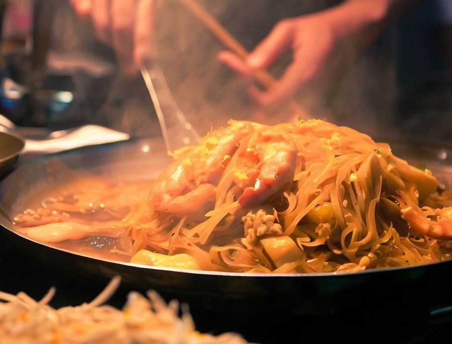Authentic Pad Thai rice noodles stir fried with tamarind and prawns